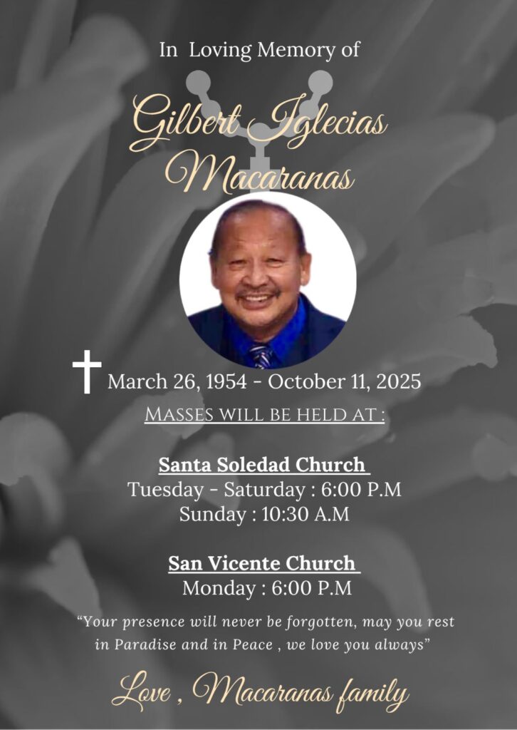 Portrait of Gilbert Iglecias Macaranas, smiling, in a blue shirt and tie.